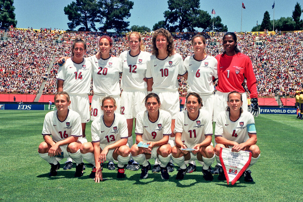 The Starting XI of the USWNT pose for a photo before their 1999 World Cup semifinal against Brazil.