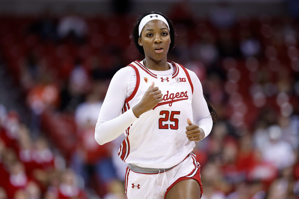 Wisconsin's Serah Williams runs down the court during a 2025 NCAA basketball game.