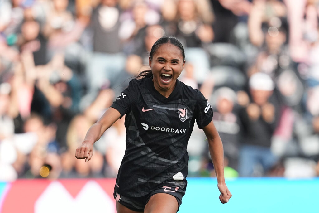 Angel City's Alyssa Thompson celebrates a goal during a 2025 NWSL match.