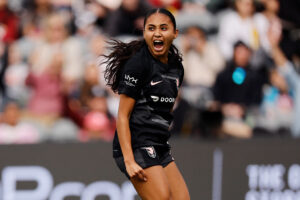 USWNT star Alyssa Thompson #21 of Angel City FC celebrates after scoring the team's first goal during the NWSL match between Angel City FC and Seattle Reign at BMO Stadium on March 30, 2025 in Los Angeles, California.