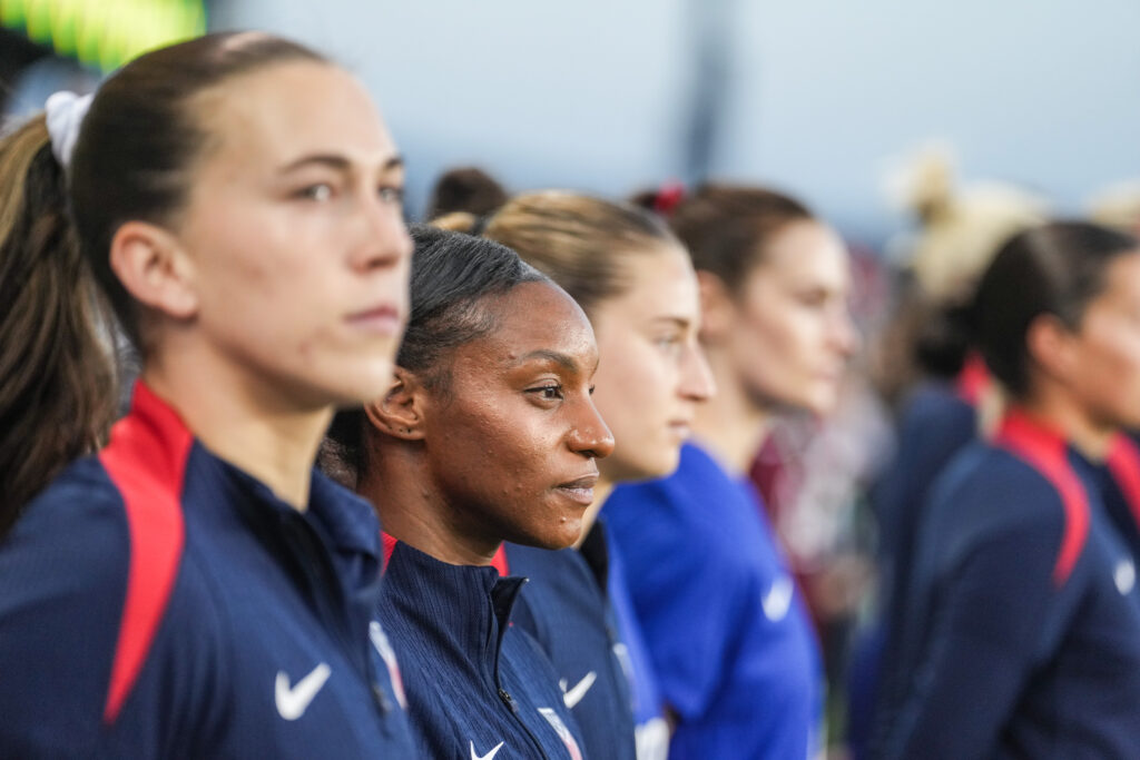 USWNT players including Sam Coffey and Crystal Dunn line up before a 2025 friendly.