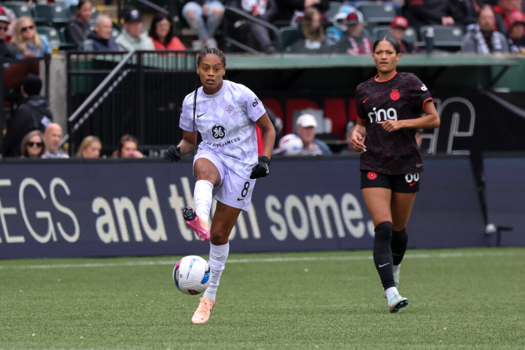 Racing Louisville's Ary Borges passes the ball during a 2025 NWSL match.