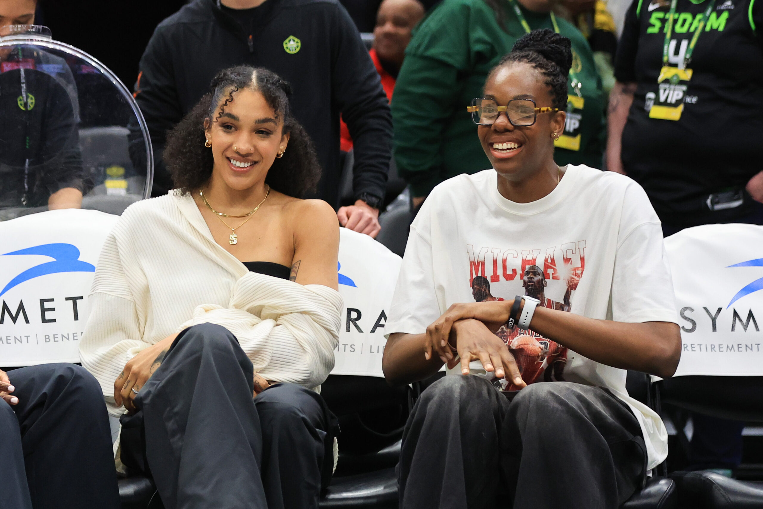Seattle Storm and France international teammates Gabby Williams and Dominique Malonga smile before a 2025 WNBA preseason game.