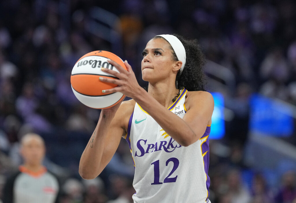 LA's Rae Burrell shoots a free throw during a 2025 WNBA preseason game.