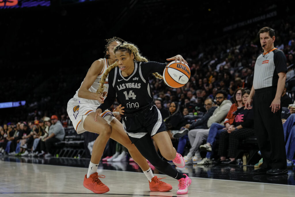 2025 WNBA draftee Harmoni Turner drives to the basket during a Las Vegas Aces preseason game.
