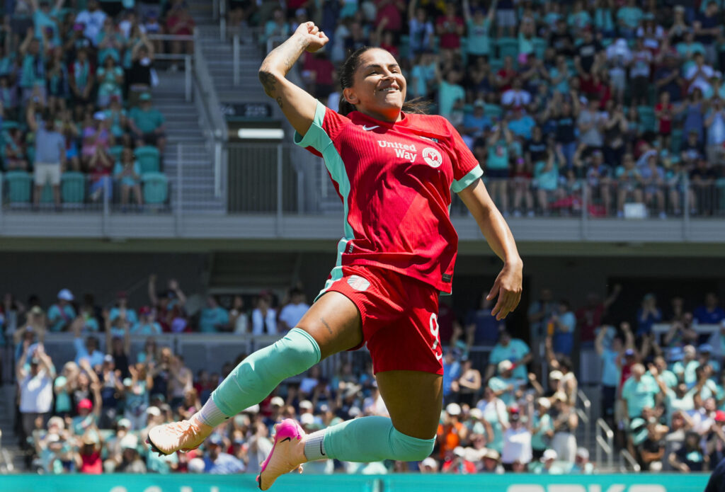 Kansas City's Debinha celebrates a goal during a 2025 NWSL match.