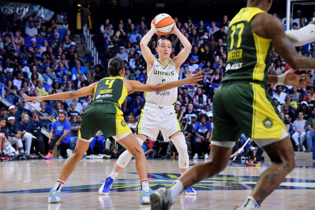 Dallas rookie Paige Bueckers sets up a pass during the Wings' Monday loss to Seattle.
