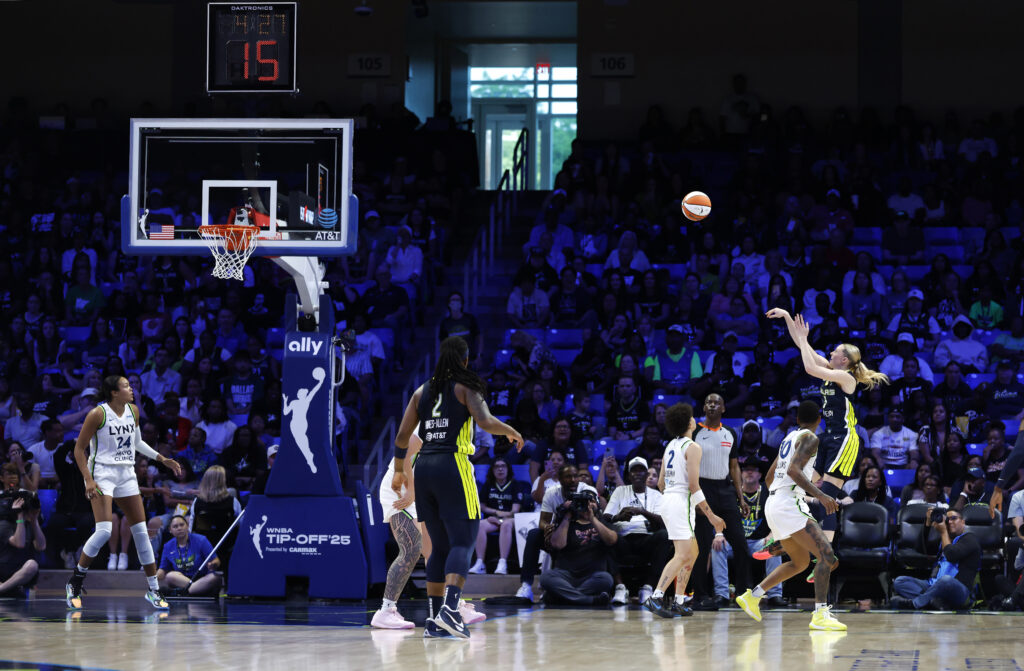 Dallas rookie Paige Bueckers takes a shot during the Wings' 2025 WNBA season opener against Minnesota.