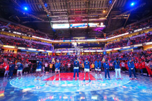 The Indiana Fever stands during the National Anthem at Gainbridge Fieldhouse before a 2025 WNBA game.