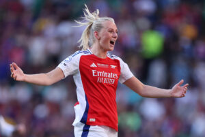 Stina Blackstenius celebrates Arsenal's 2024/25 UEFA Champions League win.