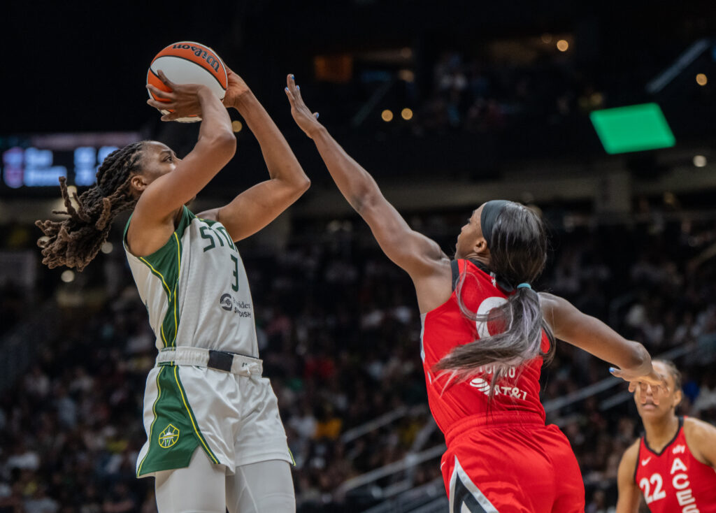 Las Vegas's Jackie Young tried to guard a shot from Seattle's Nneka Ogwumike during a 2025 WNBA game.