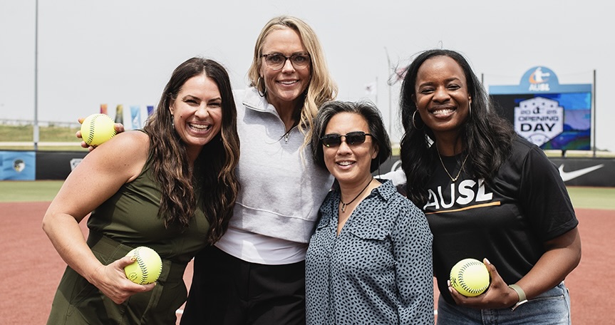 Former USA softball stars-turned-AUSL advisory board members Jessica Mendoza, Jennie Finch, and Natasha Watley pose with AUSL commissioner Kim Ng on the league's 2025 opening day.