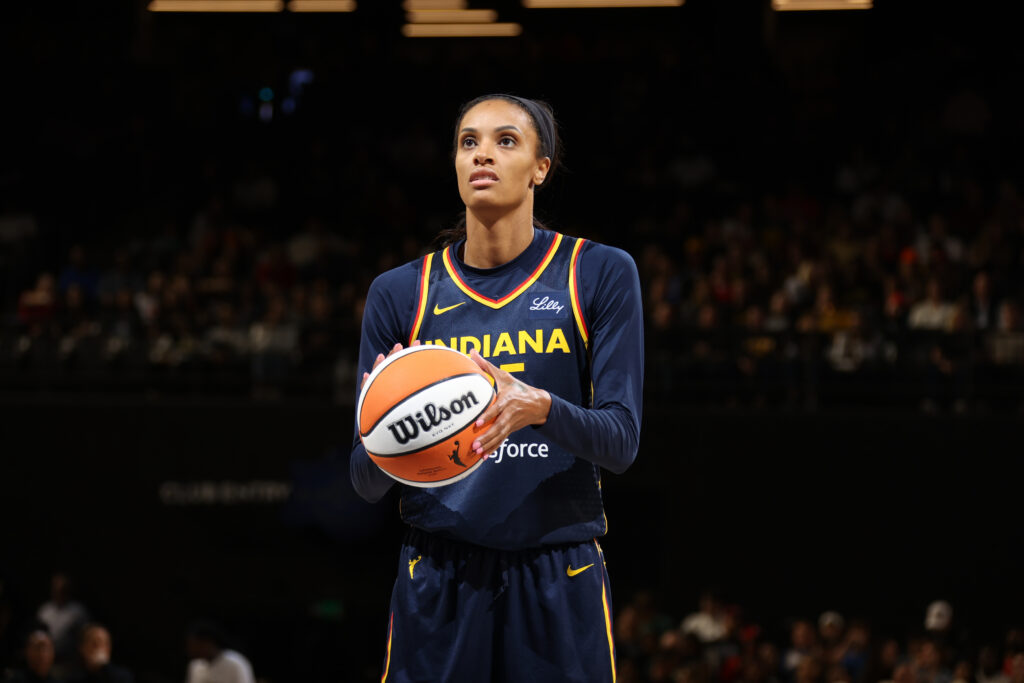 WNBA veteran DeWanna Bonner lines up a free throw during a 2025 Indiana Fever game.