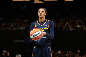 WNBA veteran DeWanna Bonner lines up a free throw during a 2025 Indiana Fever game.