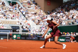 Madison Keys plays a backhand return to fellow US tennis star Hailey Baptiste during their Round of 16 match at the 2025 French Open.
