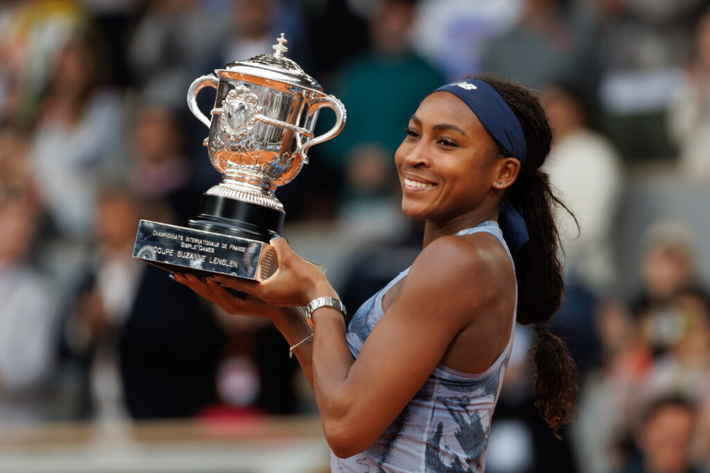 US tennis star Coco Gauff holds the 2025 French Open trophy after her championship win over Aryna Sabalenka.