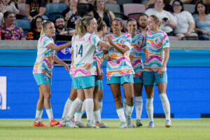 The San Diego Wave celebrate a goal by María Sánchez during a 2025 NWSL match.