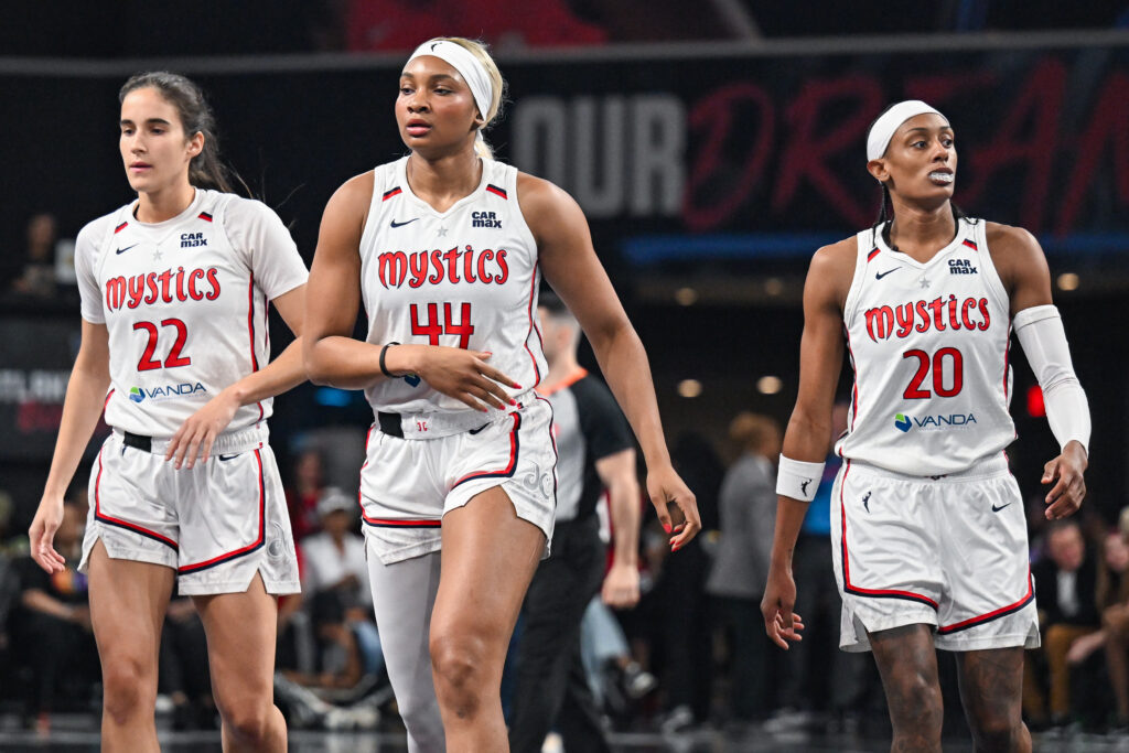 Mystic rookies Sonia Citron (22), Kiki Iriafen (44), and Brittney Sykes (20) come off the curt for a time out during the WNBA game between the Washington Mystics and the Atlanta Dream on June 20th, 2025 at Gateway Center Arena in College Park, GA. 