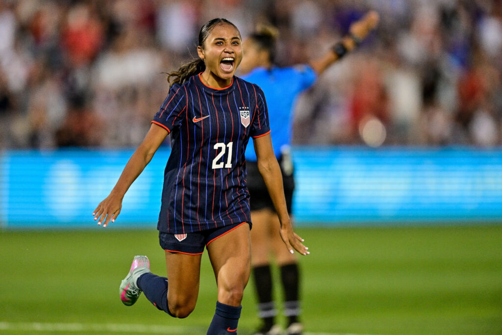 USWNT forward Alyssa Thompson celebrates a goal during a 2025 friendly against Ireland.
