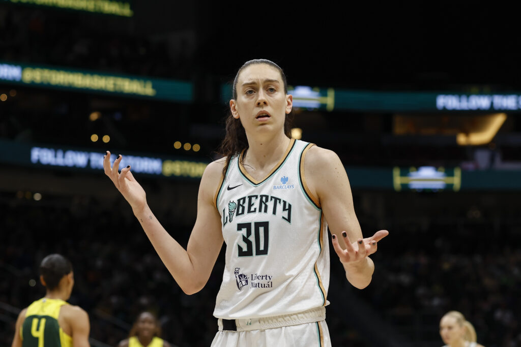 New York Liberty forward Breanna Stewart gestures questioningly during a 2025 WNBA game.