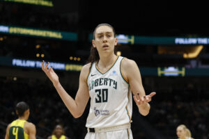 New York Liberty forward Breanna Stewart gestures questioningly during a 2025 WNBA game.