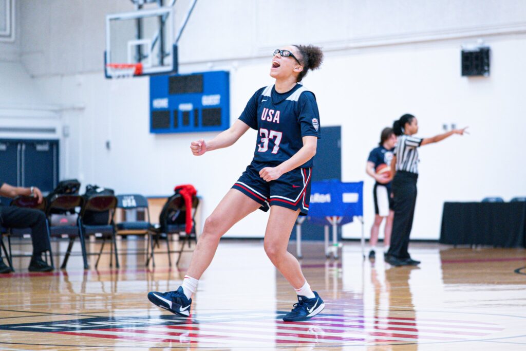 TCU basketball star Olivia Miles celebrates a play during a 2025 USA Basketball training session.
