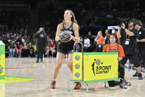 New York Liberty star Sabrina Ionescu lines up a shot during the 2023 WNBA All-Star 3-Point Contest.