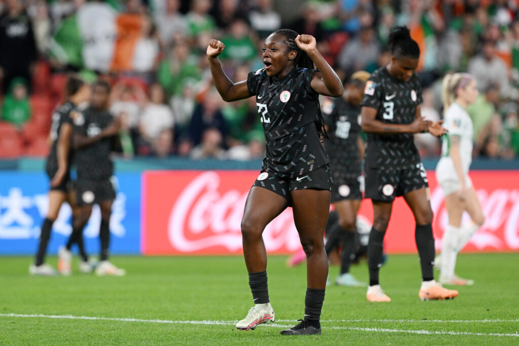 Nigeria star Michelle Alozie celebrates the Super Falcons advancing to the 2023 World Cup knockouts.