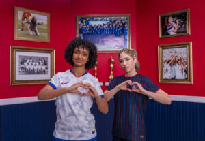 USWNT midfielders Lily Yohannes and Korbin Albert pose in the new 2025 US jerseys.