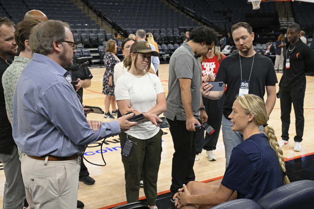 Indiana Fever guard Sophie Cunningham speaks to reporters before the 2025 WNBA Commissioner's Cup final.