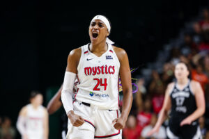 Washington Mystics forward Aaliyah Edwards celebrates a play during a 2025 WNBA game.