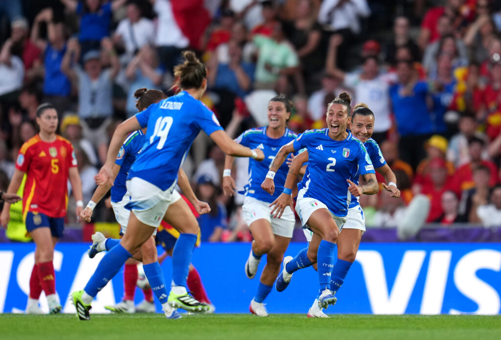 Italy's Elisabetta Oliviero celebrates a goal with her teammates during a 2025 Euro match.
