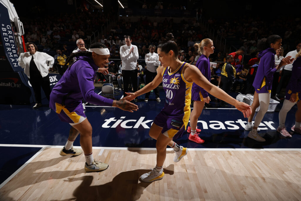 LA Sparks guard Kelsey Plum is introduced before a 2025 WNBA game.