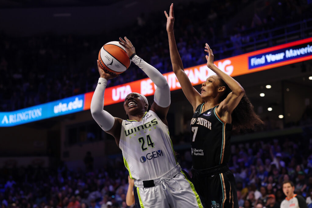 New York Liberty guard Rebekah Gardner tries to defend Dallas Wings star Arike Ogunbowale during a 2025 WNBA game.