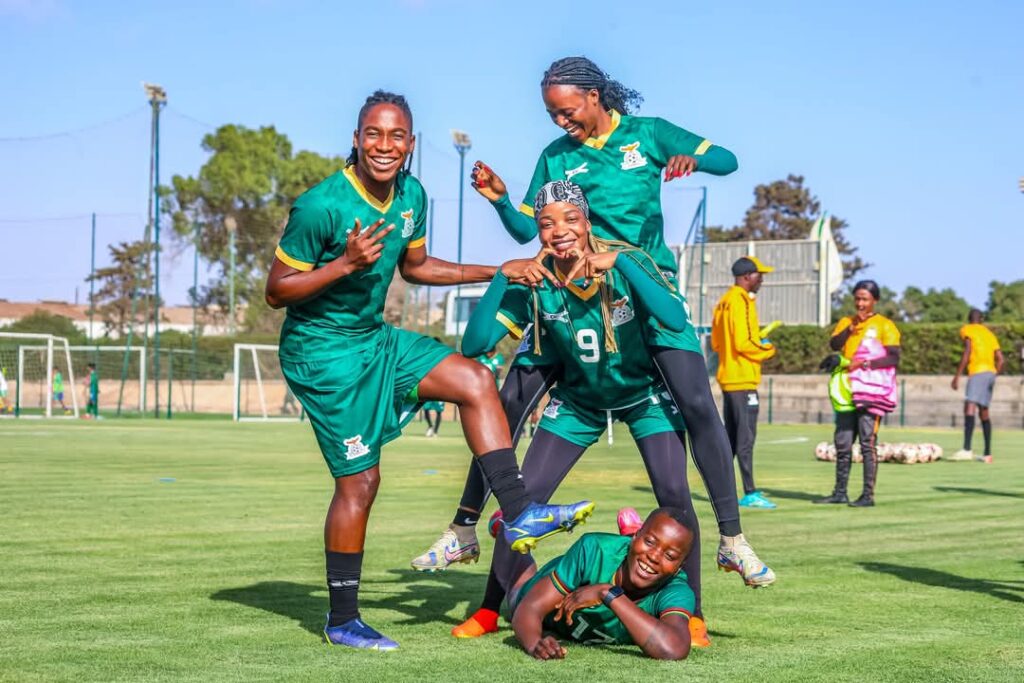 Zambia players, including NWSL stars Barbra Banda and Racheal Kundananji, pose during a training session before 2025 WAFCON.
