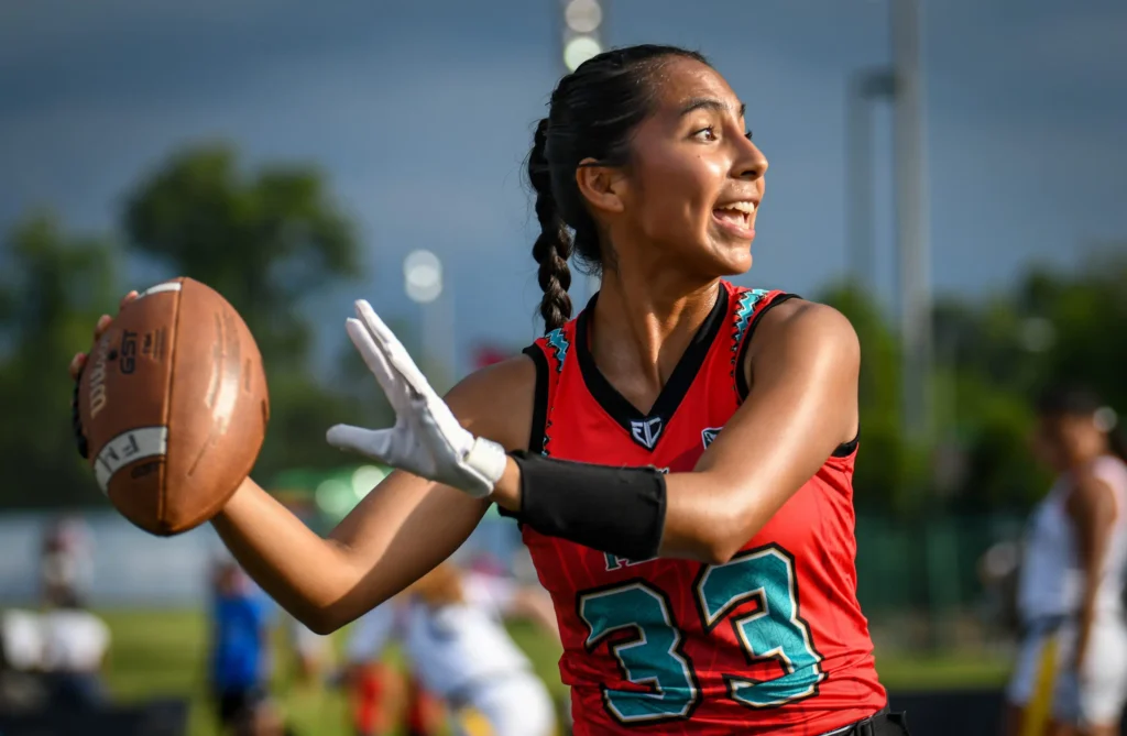 Mexico flag football quarterback Diana Flores, a 2022 World Games gold medalist, prepares a pass.