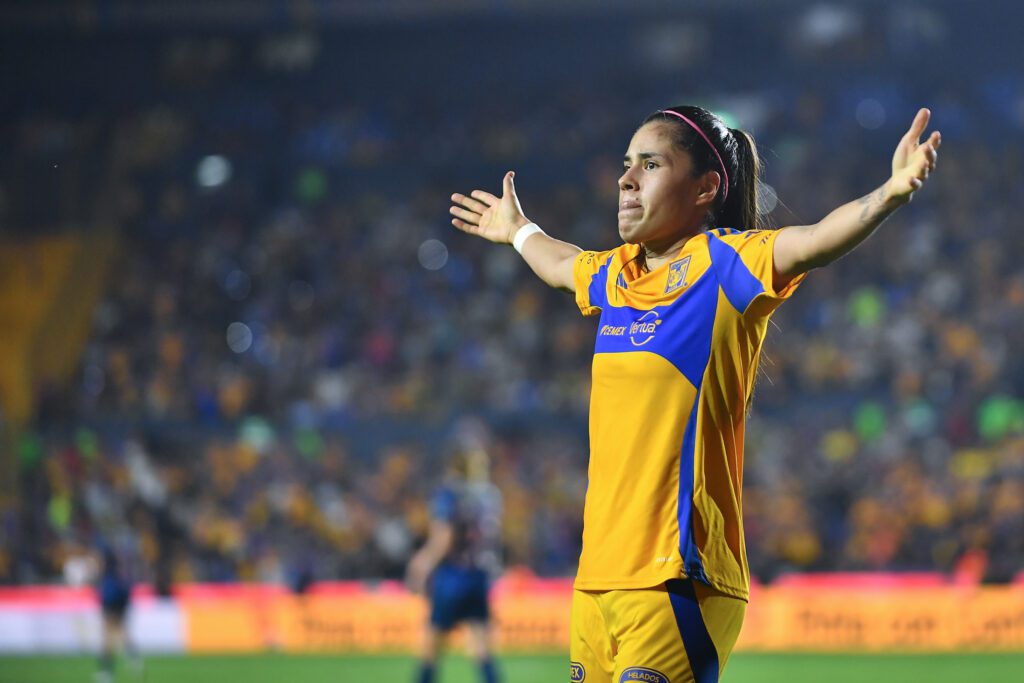 Tigres UANL forward Lizbeth Ovalle celebrates a goal during a 2024 Liga MX match.