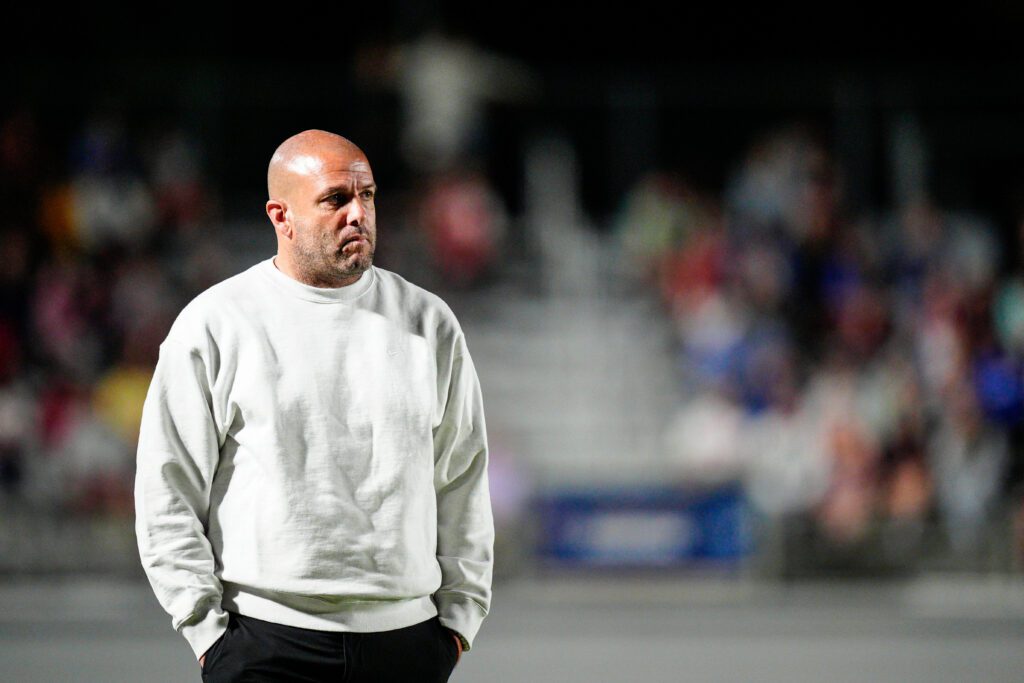 North Carolina Courage head coach Sean Nahas looks on during a 2025 NWSL match.