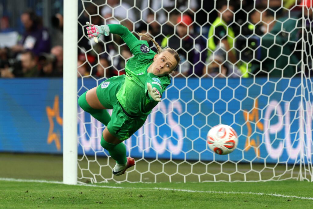 England goalkeeper Hannah Hampton dives for the ball during the 2025 Euro final penalty shootout.