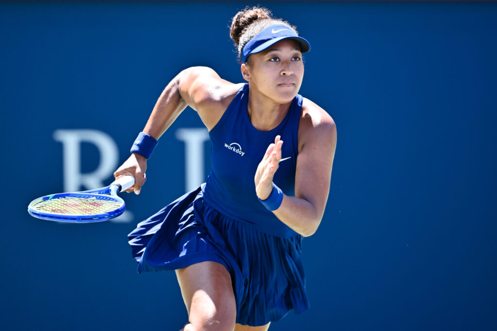 Japan tennis star Naomi Osaka races across the court during a 2025 Canadian Open match.