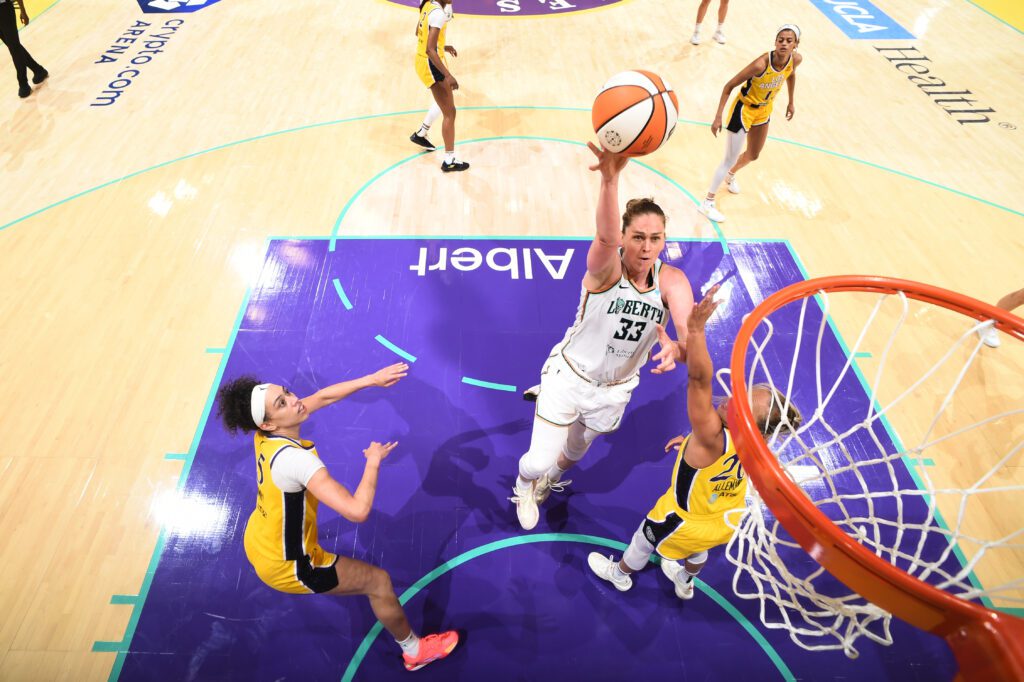 New York Liberty forward Emma Meesseman drives to the basket against the LA Sparks in a 2025 WNBA game.