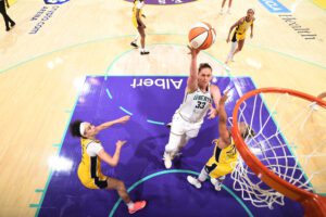 New York Liberty forward Emma Meesseman drives to the basket against the LA Sparks in a 2025 WNBA game.
