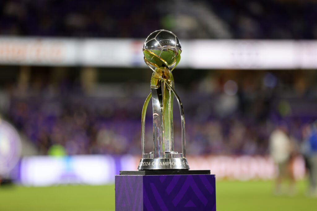 The Orlando Pride's 2024 NWSL Championship trophy sits on display before a March 2025 match.