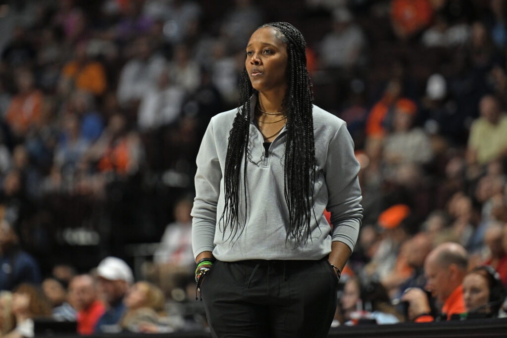 Seattle Storm head coach Noelle Quinn looks on from the sideline during a 2025 WNBA game.