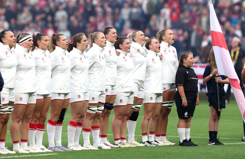 England players sing their national anthem before kicking off the 2025 Women's Rugby World Cup.
