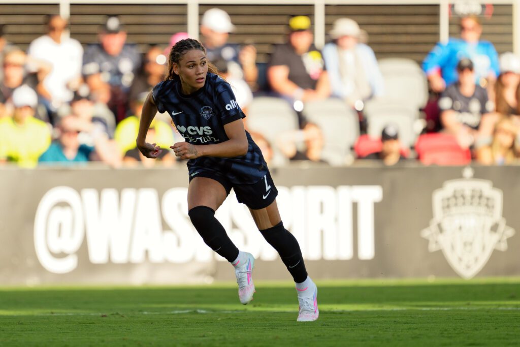 Washington Spirit forward Trinity Rodman sprints up the pitch during a 2025 NWSL match.