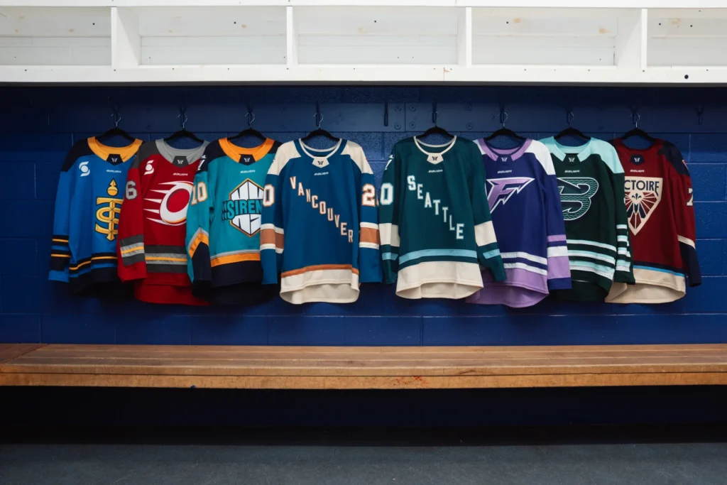 The jerseys of all eight PWHL teams hang on display weeks before the 2025/26 season begins.