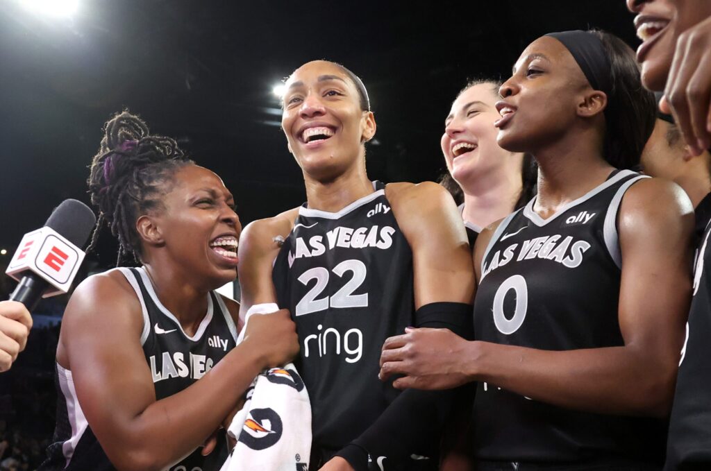 Las Vegas Aces stars Chelsea Gray, A'ja Wilson, and Jackie Young are interviewed after winning Game 5 of the 2025 WNBA semifinals.