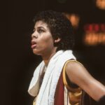 USC legend Cheryl Miller looks on during a 1983 NCAA basketball game.