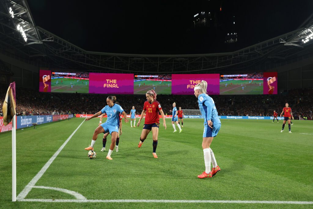 England attacker Lauren James controls the ball near a corner flag during the 2023 World Cup final against Spain.